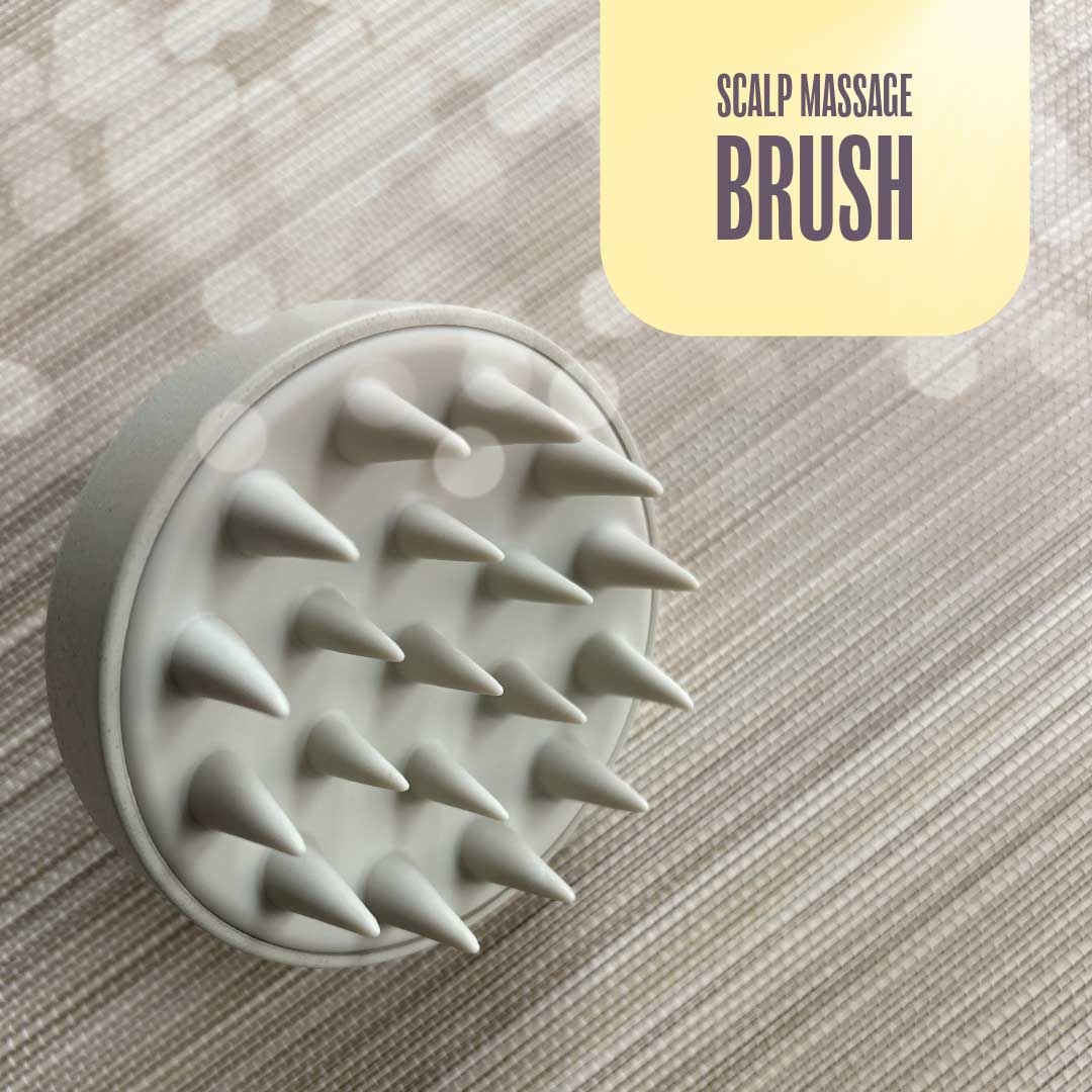 Foto af en scalp massage brush